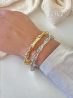 Twisted Elegance: Textured Bamboo Cubic Zirconia Bangle