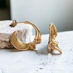 Radiant Twist: Gold-Plated Open Hoop Earrings