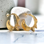 Radiant Twist: Gold-Plated Open Hoop Earrings